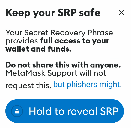 Metamask asking the user to press and hold a button to reveal the seed phrase